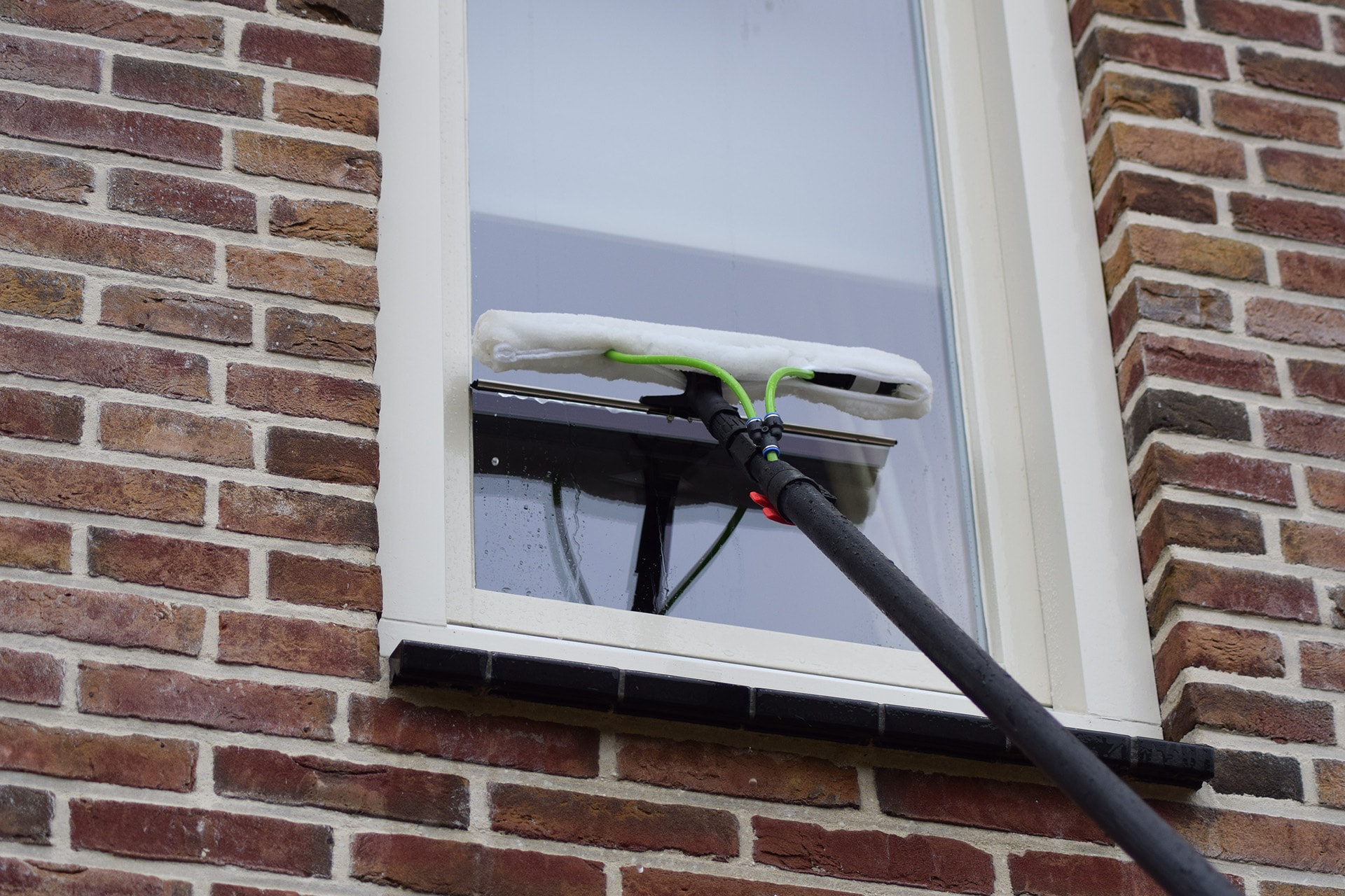 Ramentrekker op telescoopsteel