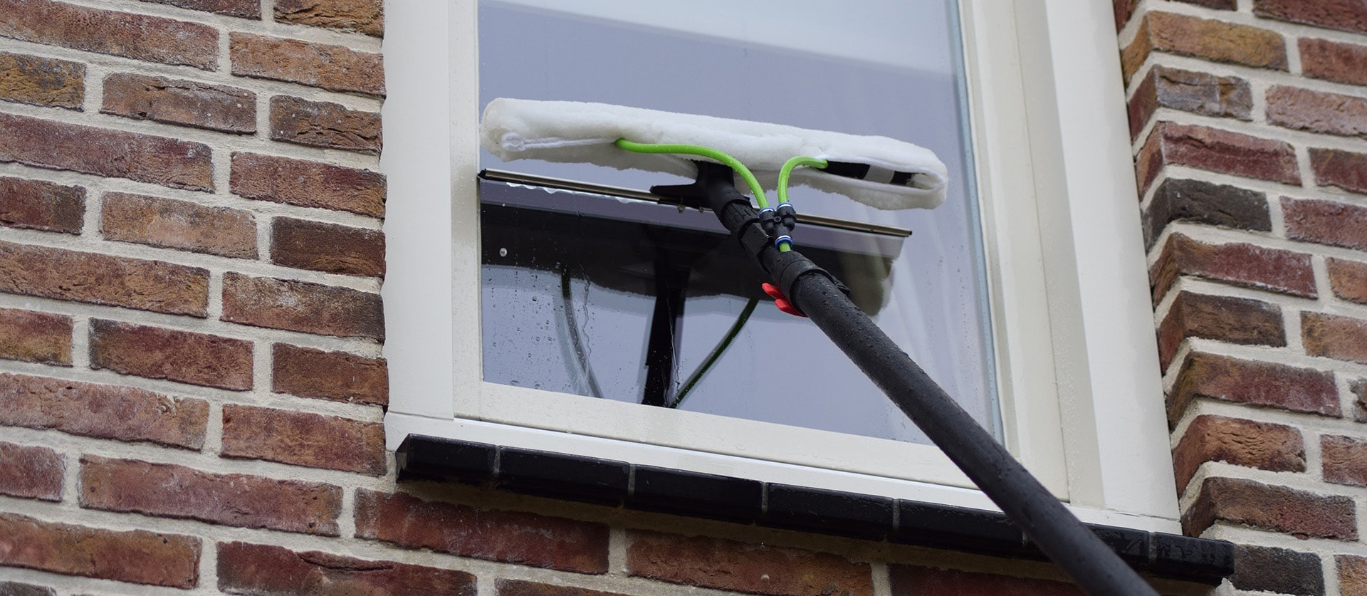 hoge ramen wassen met telescoopsteel